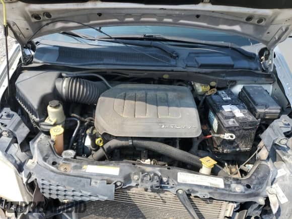 2012 Dodge Grand Caravan SXT z VIN 2C4RDGCG3CR384637, wystawiony jako Copart lot #69652525 z przebiegiem 238 929 mil mil oraz Szkoda całkowita • Salvage title. Historia ofert i sprzedaży dostępna na DreamBid. Obrazek 12.