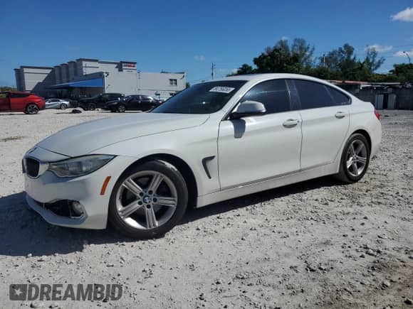 2015 BMW 4 Series 428i z VIN WBA4A5C58FGK16159, wystawiony jako Copart lot #84756055 z przebiegiem 134 614 mil mil oraz Szkoda całkowita • Salvage title. Historia ofert i sprzedaży dostępna na DreamBid. Obrazek 1.