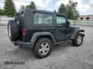 2010 Jeep Wrangler Islander z VIN 1J4AA2D16AL171507, wystawiony jako Copart lot #61957905 z przebiegiem 132 462 mil mil oraz Czysty tytuł • Clean title. Historia ofert i sprzedaży dostępna na DreamBid. Obrazek 3.