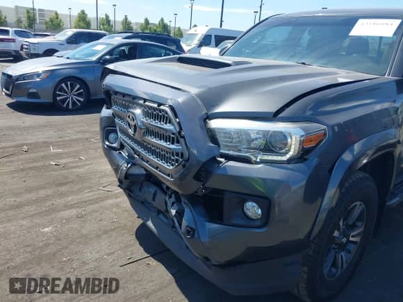 2016 Toyota Tacoma SR5 with VIN 3TMAZ5CNXGM009360, listed as a IAAI auction lot 43186084 with 89,490 mi miles and . Bid and sale history available at DreamBid. Image 18.