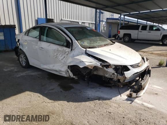 2020 Chevrolet Sonic LT with VIN 1G1JD5SB0L4105471, listed as a Copart auction lot 71130445 with Not provided miles and Salvage title. Bid and sale history available at DreamBid. Image 4.