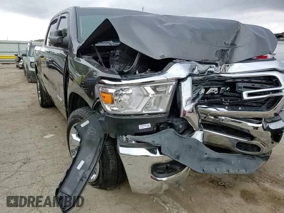 2020 Ram 1500 Big Horn z VIN 1C6SRFFT4LN181329, wystawiony jako Copart lot #58519395 z przebiegiem 60 023 mil mil oraz Szkoda całkowita • Salvage title. Historia ofert i sprzedaży dostępna na DreamBid. Obrazek 13.