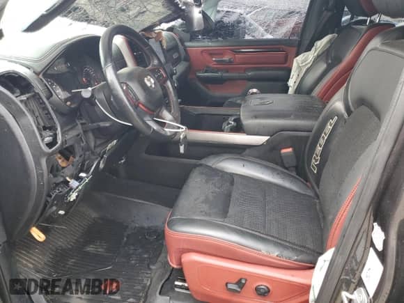 2019 Ram 1500 Rebel z VIN 1C6RRELT7KN724233, wystawiony jako Copart lot #86823514 z przebiegiem 96 464 mil mil oraz Czysty tytuł • Clean title. Historia ofert i sprzedaży dostępna na DreamBid. Obrazek 7.