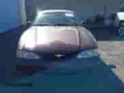 1996 Ford Mustang GT z VIN 1FALP42X2TF130573, wystawiony jako IAAI lot #43490908 z przebiegiem 281 802 mil mil oraz . Historia ofert i sprzedaży dostępna na DreamBid. Obrazek 6.