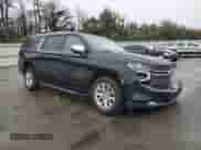 2023 Chevrolet Suburban Premier with VIN 1GNSKFKD1PR184075, listed as a Copart auction lot 81792555 with 74,078 mi miles and Salvage title. Bid and sale history available at DreamBid. Image 4.