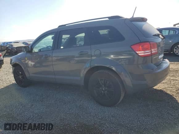 2020 Dodge Journey SE Value with VIN 3C4PDCAB7LT269012, listed as a Copart auction lot 80215135 with 80,459 mi miles and Salvage title. Bid and sale history available at DreamBid. Image 2.