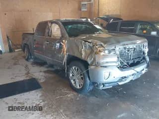 2017 Chevrolet Silverado 1500 High Country with VIN 3GCUKTEJ9HG193013, listed as a IAAI auction lot 41543254 with 103,438 mi miles and . Bid and sale history available at DreamBid. Image 1.