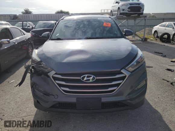 2018 Hyundai Tucson SEL с VIN KM8J3CA45JU679929, выставлен на аукционе Copart как лот 63600225 с пробегом Не указан миль и Списание • Salvage title. История ставок и продаж доступна на DreamBid. Изображение 5.