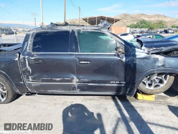 2019 Ram 1500 Limited z VIN 1C6SRFHT8KN839939, wystawiony jako IAAI lot #42225074 z przebiegiem Nie podano mil oraz . Historia ofert i sprzedaży dostępna na DreamBid. Obrazek 5.