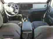 2025 Jeep Wrangler Sahara with VIN 1C4RJXP6XSW579389, listed as a Copart auction lot 82042905 with 11,393 mi miles and Clean title. Bid and sale history available at DreamBid. Image 8.