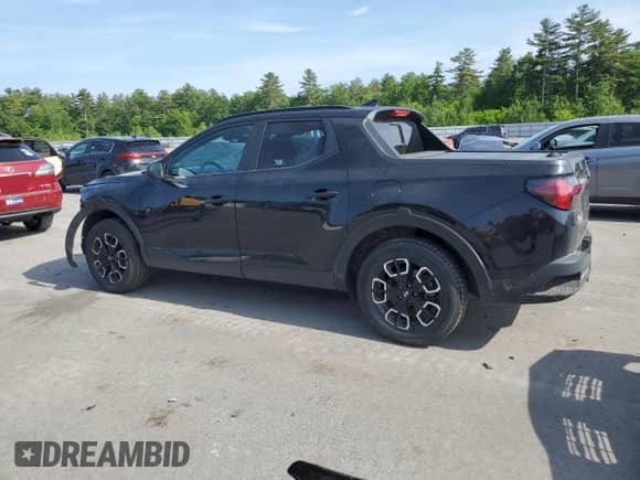 2023 Hyundai Santa Cruz SEL Premium with VIN 5NTJDDAF3PH057049, listed as a Copart auction lot 61165645 with 75,980 mi miles and Salvage title. Bid and sale history available at DreamBid. Image 2.