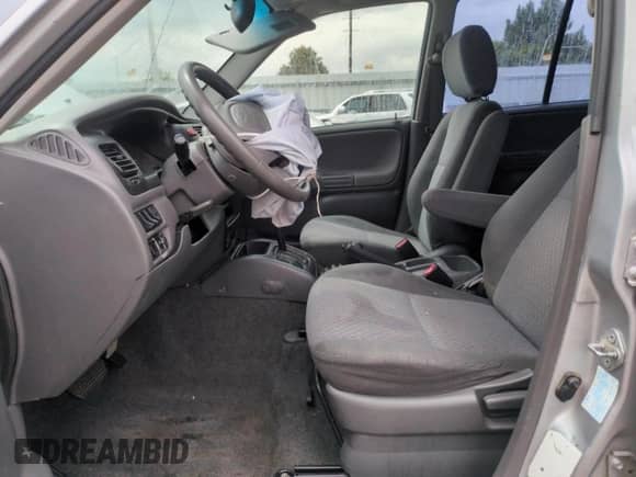 2002 Chevrolet Tracker with VIN 2CNBJ13C726916911, listed as a Copart auction lot 59333975 with 197,754 mi miles and Salvage title. Bid and sale history available at DreamBid. Image 7.