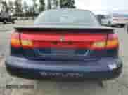 1999 Saturn SC with VIN 1G8ZY1273XZ328268, listed as a Copart auction lot 61796915 with 151,562 mi miles and Salvage title. Bid and sale history available at DreamBid. Image 6.