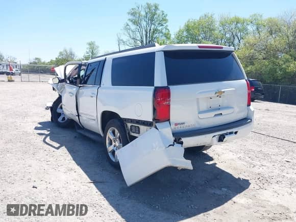 2017 Chevrolet Suburban LT z VIN 1GNSCHKC0HR252447, wystawiony jako IAAI lot #42233524 z przebiegiem Nie podano mil oraz . Historia ofert i sprzedaży dostępna na DreamBid. Obrazek 3.