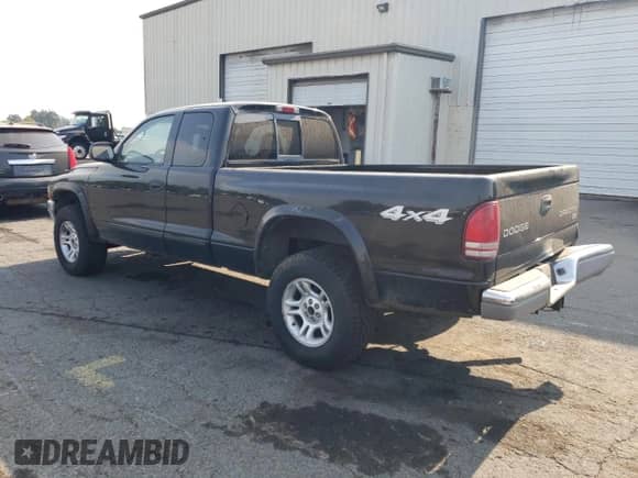 2004 Dodge Dakota SLT с VIN 1D7HG42N14S565713, выставлен на аукционе Copart как лот 70764455 с пробегом 118 859 миль миль и Списание • Salvage title. История ставок и продаж доступна на DreamBid. Изображение 2.