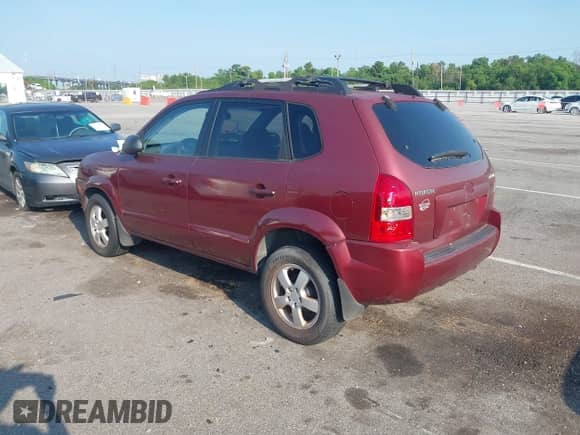 2006 Hyundai Tucson GL z VIN KM8JM12BX6U250629, wystawiony jako IAAI lot #42962590 z przebiegiem Nie podano mil oraz . Historia ofert i sprzedaży dostępna na DreamBid. Obrazek 3.