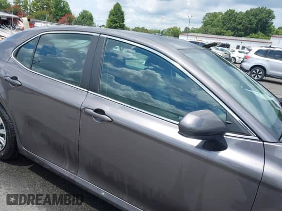 2022 Toyota Camry Hybrid LE with VIN 4T1C31AK9NU036999, listed as a IAAI auction lot 42741455 with 68,970 mi miles and . Bid and sale history available at DreamBid. Image 14.