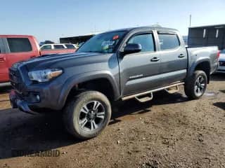 2019 Toyota Tacoma SR with VIN 3TMCZ5AN1KM216028, listed as a Copart auction lot 80534395 with 69,378 mi miles and Salvage title. Bid and sale history available at DreamBid. Image 1.