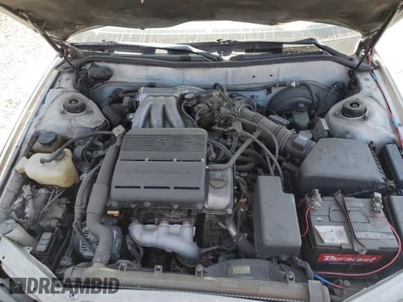 1995 Toyota Camry LE with VIN JT2GK12E3S0081465, listed as a Copart auction lot 80890595 with 105,832 mi miles and Salvage title. Bid and sale history available at DreamBid. Image 11.