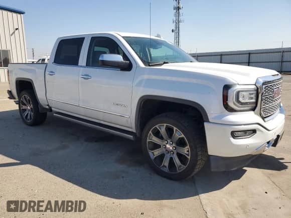 2016 GMC Sierra 1500 Denali z VIN 3GTU2PEJ2GG371785, wystawiony jako Copart lot #81668355 z przebiegiem 82 938 mil mil oraz Szkoda całkowita • Salvage title. Historia ofert i sprzedaży dostępna na DreamBid. Obrazek 4.
