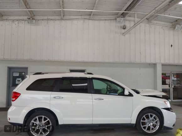 2012 Dodge Journey Crew with VIN 3C4PDCDG4CT392046, listed as a IAAI auction lot 42474542 with 112,128 mi miles and . Bid and sale history available at DreamBid. Image 14.