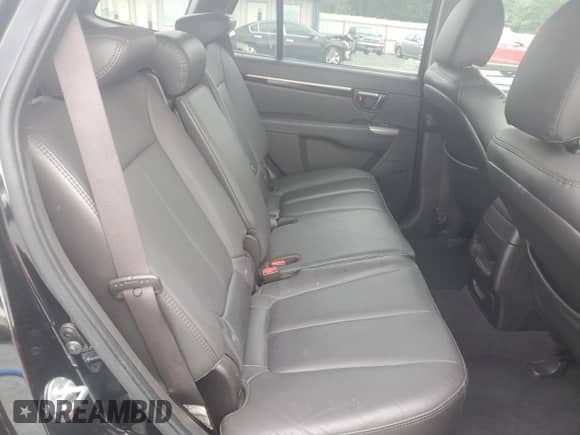2011 Hyundai Santa Fe Limited z VIN 5XYZK3AB9BG044286, wystawiony jako Copart lot #68007995 z przebiegiem 147 180 mil mil oraz Szkoda całkowita • Salvage title. Historia ofert i sprzedaży dostępna na DreamBid. Obrazek 10.