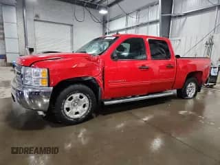 2013 Chevrolet Silverado 1500 LT with VIN 3GCPKSE74DG308218, listed as a Copart auction lot 71018335 with 70,370 mi miles and Salvage title. Bid and sale history available at DreamBid. Image 1.