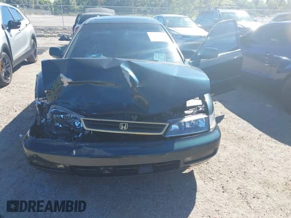 1996 Honda Accord EX z VIN 1HGCE6670TA006564, wystawiony jako IAAI lot #43471466 z przebiegiem 83 465 mil mil oraz . Historia ofert i sprzedaży dostępna na DreamBid. Obrazek 6.