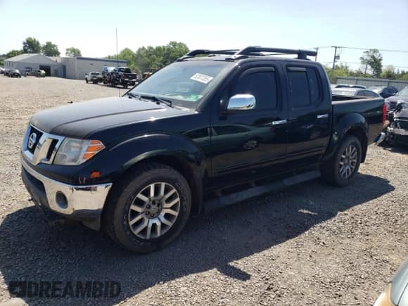 2010 Nissan Frontier Pro-4X with VIN 1N6AD0EV1AC447205, listed as a Copart auction lot 62007355 with 128,371 mi miles and Clean title. Bid and sale history available at DreamBid. Image 1.