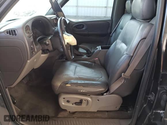 2003 Chevrolet TrailBlazer LTZ z VIN 1GNDT13S932135702, wystawiony jako Copart lot #65800125 z przebiegiem Nie podano mil oraz Szkoda całkowita • Salvage title. Historia ofert i sprzedaży dostępna na DreamBid. Obrazek 7.