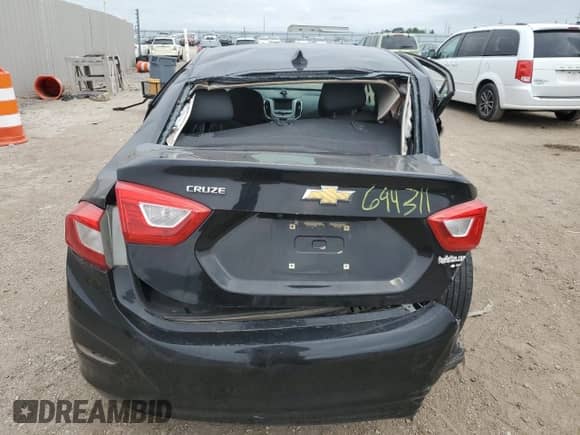 2017 Chevrolet Cruze LS with VIN 1G1BC5SMXH7120252, listed as a Copart auction lot 70664335 with 143,503 mi miles and Salvage title. Bid and sale history available at DreamBid. Image 6.