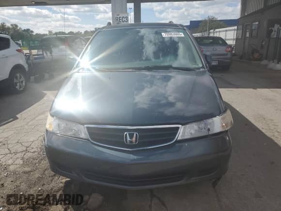 2004 Honda Odyssey EX-RES с VIN 5FNRL18834B127296, выставлен на аукционе Copart как лот 70983665 с пробегом 99 715 миль миль и Списание • Salvage title. История ставок и продаж доступна на DreamBid. Изображение 5.