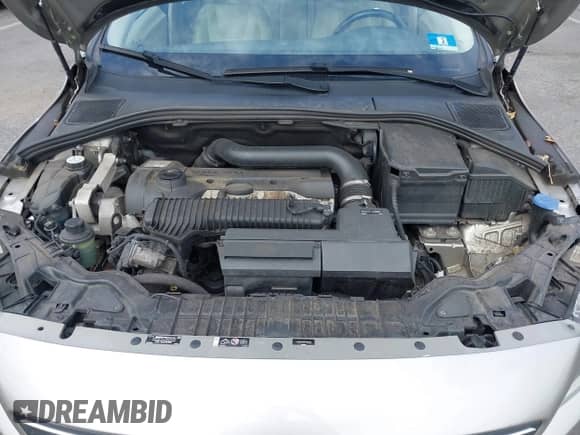 2015 Volvo S60 T5 Premier z VIN YV1612TK9F1346142, wystawiony jako IAAI lot #43228507 z przebiegiem 119 564 mil mil oraz . Historia ofert i sprzedaży dostępna na DreamBid. Obrazek 10.