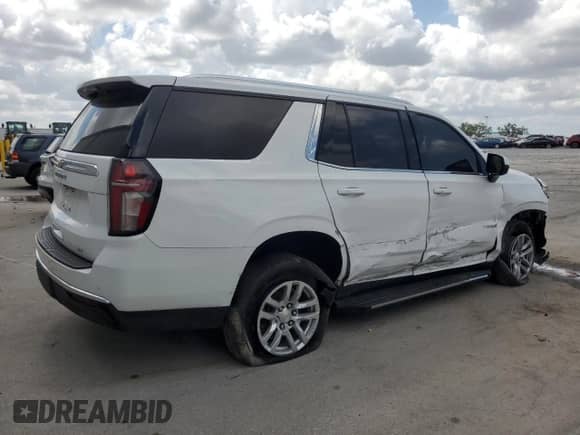 2021 Chevrolet Tahoe LT с VIN 1GNSCNKDXMR370619, выставлен на аукционе Copart как лот 54683085 с пробегом 90 950 миль миль и Списание • Salvage title. История ставок и продаж доступна на DreamBid. Изображение 3.
