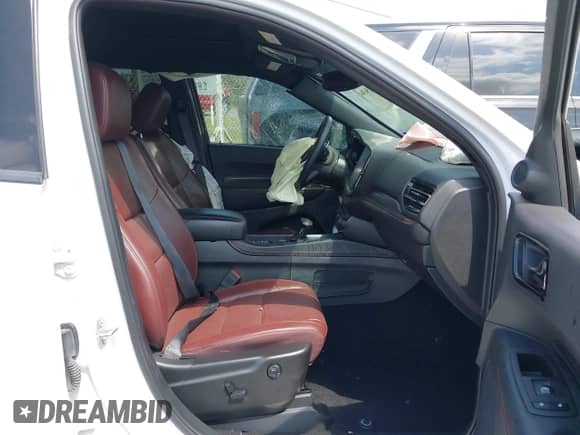 2023 Dodge Durango R/T Plus z VIN 1C4SDHCT7PC686970, wystawiony jako IAAI lot #42156304 z przebiegiem 14 592 mil mil oraz . Historia ofert i sprzedaży dostępna na DreamBid. Obrazek 5.