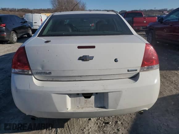 2012 Chevrolet Impala Police Police with VIN 2G1WD5E31C1151753, listed as a Copart auction lot 46351215 with 128,468 mi miles and Salvage title. Bid and sale history available at DreamBid. Image 6.