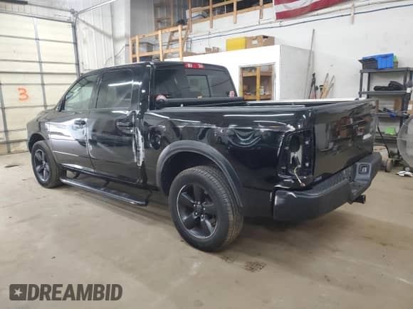 2019 Ram 1500 SLT with VIN 1C6RR7LG7KS671534, listed as a Copart auction lot 53096865 with 46,496 mi miles and Salvage title. Bid and sale history available at DreamBid. Image 2.