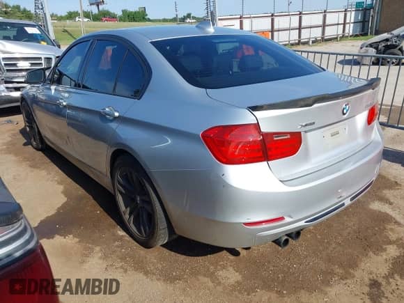 2013 BMW 3 Series 328i xDrive with VIN WBA3B3G52DNR79973, listed as a IAAI auction lot 43012817 with 138,913 mi miles and . Bid and sale history available at DreamBid. Image 3.