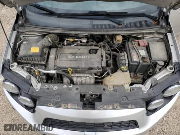 2013 Chevrolet Sonic LTZ с VIN 1G1JE5SH7D4152807, выставлен на аукционе Copart как лот 58600395 с пробегом 129 542 миль миль и Списание • Salvage title. История ставок и продаж доступна на DreamBid. Изображение 11.