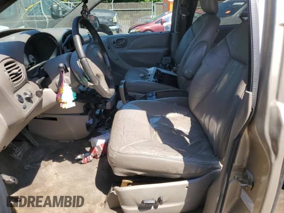 2003 Dodge Grand Caravan with VIN 2D8GT54L83R125380, listed as a Copart auction lot 58954995 with 185,904 mi miles and Salvage title. Bid and sale history available at DreamBid. Image 7.