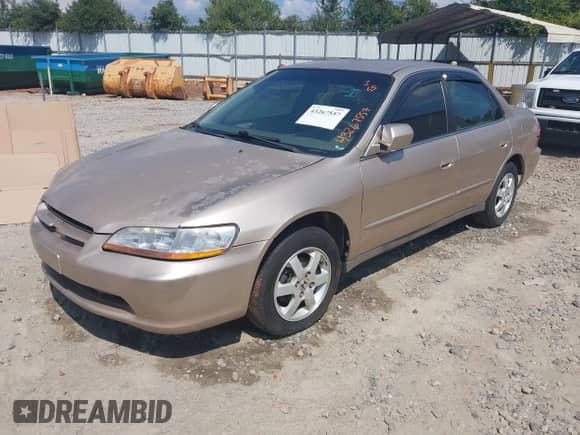 2000 Honda Accord SE with VIN 1HGCG6694YA099009, listed as a IAAI auction lot 43267557 with 202,986 mi miles and . Bid and sale history available at DreamBid. Image 2.