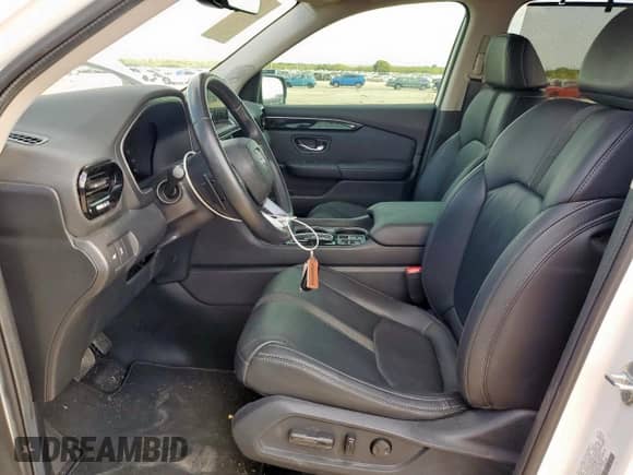 2024 Honda Pilot Touring with VIN 5FNYG1H72RB023817, listed as a Copart auction lot 69754565 with 30,118 mi miles and Salvage title. Bid and sale history available at DreamBid. Image 7.
