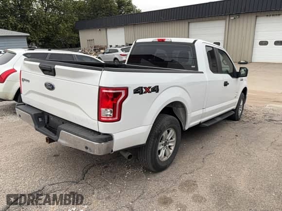 2017 Ford F-150 XL with VIN 1FTFX1EG2HFA35357, listed as a Copart auction lot 90418675 with 159,563 mi miles and Clean title. Bid and sale history available at DreamBid. Image 4.
