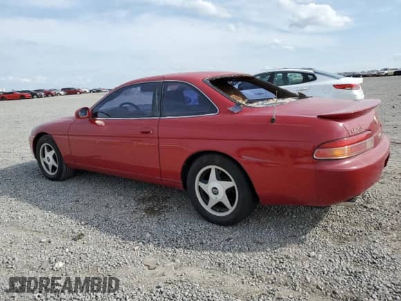 1996 Lexus SC 400 with VIN JT8CH32Y1T0051116, listed as a Copart auction lot 51518155 with 94,156 mi miles and Salvage title. Bid and sale history available at DreamBid. Image 2.