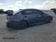 2018 Subaru WRX с VIN JF1VA1A61J9803253, выставлен на аукционе Copart как лот 70902075 с пробегом 77 789 миль миль и Списание • Salvage title. История ставок и продаж доступна на DreamBid. Изображение 3.