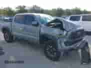 2021 Toyota Tacoma SR with VIN 3TYCZ5ANXMT024937, listed as a IAAI auction lot 43314888 with 77,580 mi miles and . Bid and sale history available at DreamBid. Image 1.