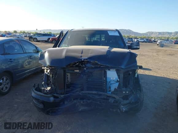 2020 Ram 1500 Big Horn with VIN 1C6SRFFT9LN308110, listed as a IAAI auction lot 41975063 with 98,410 mi miles and . Bid and sale history available at DreamBid. Image 6.