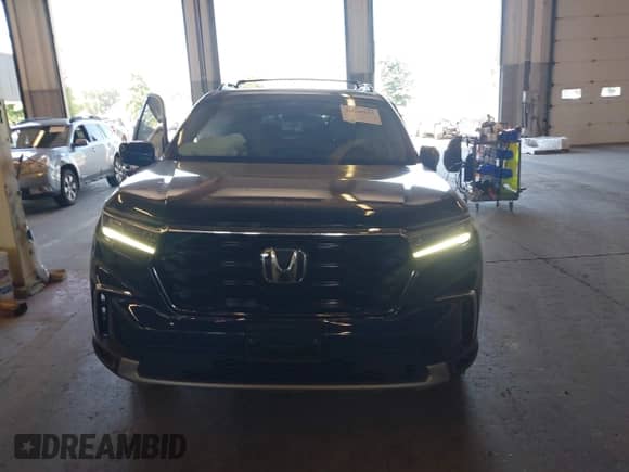 2023 Honda Pilot Touring с VIN 5FNYG1H72PB042624, выставлен на аукционе IAAI как лот 42860512 с пробегом 37 495 миль миль и . История ставок и продаж доступна на DreamBid. Изображение 13.