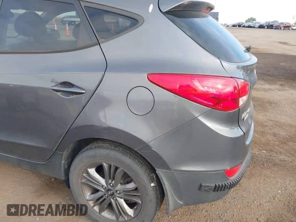 2014 Hyundai Tucson GLS with VIN KM8JTCAFXEU950569, listed as a IAAI auction lot 43243357 with 146,413 mi miles and . Bid and sale history available at DreamBid. Image 6.