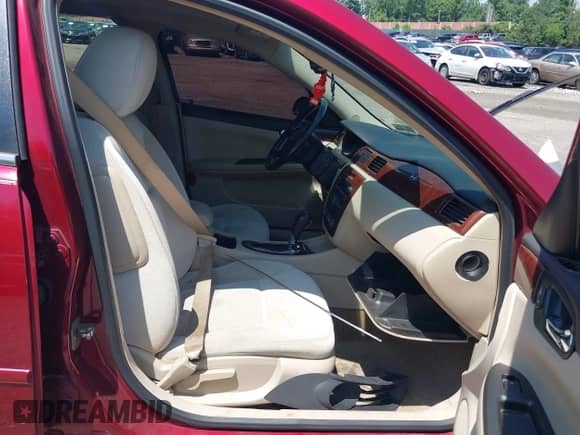 2009 Chevrolet Impala LT with VIN 2G1WC57M191251403, listed as a IAAI auction lot 42721205 with 86,982 mi miles and . Bid and sale history available at DreamBid. Image 5.